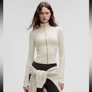 Lululemon Define Cropped Jacket Nulu.Bone/Gold.Size 12. Cream tone w/gold zipper